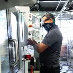 man working on machine